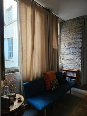 Coin salon dans l'établissement Suite privée Terreaux