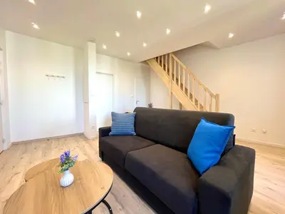 Coin salon dans l'établissement Duplex urbain proche centre-ville de Lyon - 6 pers