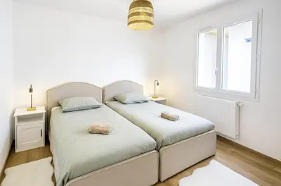 Un ou plusieurs lits dans un hébergement de l'établissement Maison de Standing 3 Chambres Parking Spacieux