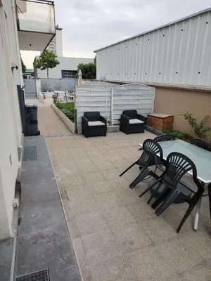 Coin salon dans l'établissement Joli appartement T2 avec terrasse
