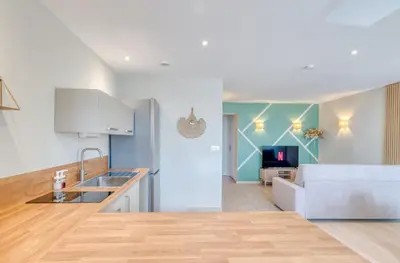 Cuisine ou kitchenette dans l'établissement L'Élégant - T3 neuf - Montluel