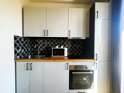 Cuisine ou kitchenette dans l'établissement Suite Nayrobi - Appartement 2 personnes - Check in h24 & wifi