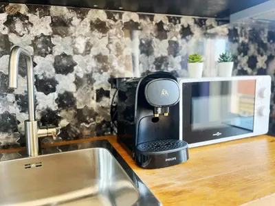 Cuisine ou kitchenette dans l'établissement Suite Nayrobi - Appartement 2 personnes - Check in h24 & wifi
