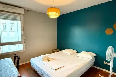 Un ou plusieurs lits dans un hébergement de l'établissement Balcon Jubin