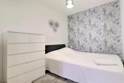 Un ou plusieurs lits dans un hébergement de l'établissement Appartement T2 - Quartier Charpennes à Villeurbanne