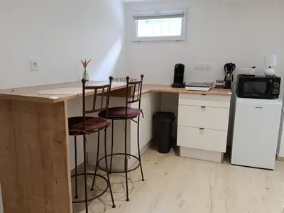 Cuisine ou kitchenette dans l'établissement L'ôNelTa