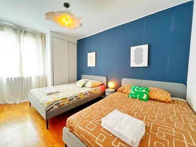 Un ou plusieurs lits dans un hébergement de l'établissement Suite Petite soeur - Appartement 6 & 8 personnes - Check in H24 & Wifi