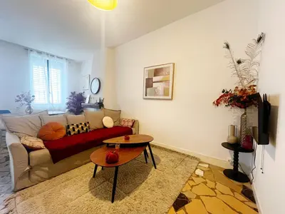 Coin salon dans l'établissement Songoria - Appartement 4 personnes - check in h24 & wifi