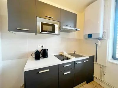 Cuisine ou kitchenette dans l'établissement Songoria - Appartement 4 personnes - check in h24 & wifi