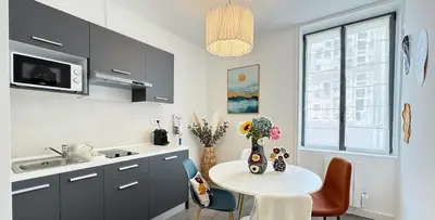 Cuisine ou kitchenette dans l'établissement Songoria - Appartement 4 personnes - check in h24 & wifi