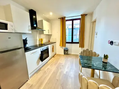 Cuisine ou kitchenette dans l'établissement L'évasion Ansoise