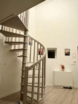 Télévision ou salle de divertissement dans l'établissement Maisonnette au milieu de vignes