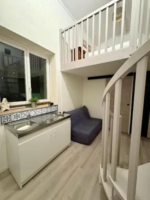 Coin salon dans l'établissement Maisonnette au milieu de vignes