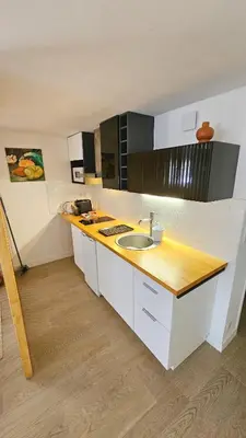 Cuisine ou kitchenette dans l'établissement Le Bachely - Meublé de tourisme classé 3 étoiles