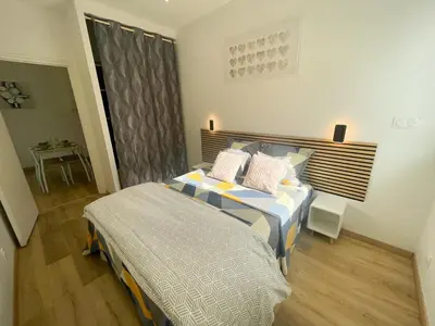 Un ou plusieurs lits dans un hébergement de l'établissement T2 Sweet Horizon 2 - B at Home - Stade Groupama LDLC