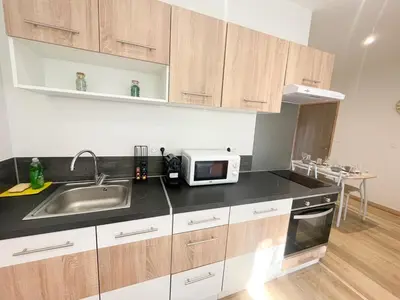 Cuisine ou kitchenette dans l'établissement T2 Sweet Horizon 2 - B at Home - Stade Groupama LDLC