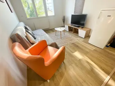 Télévision ou salle de divertissement dans l'établissement T2 Sweet Horizon 2 - B at Home - Stade Groupama LDLC