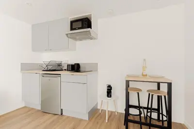 Cuisine ou kitchenette dans l'établissement Le Patio Zen
