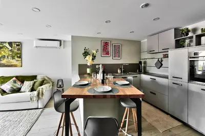 Cuisine ou kitchenette dans l'établissement Chez Patricia en Beaujolais