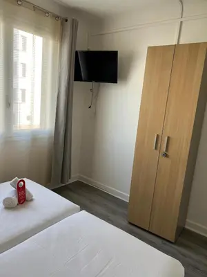 Un ou plusieurs lits dans un hébergement de l'établissement Central Hôtel