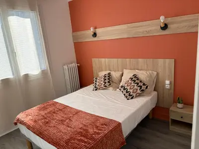 Un ou plusieurs lits dans un hébergement de l'établissement Central Hôtel