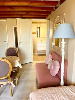 Un ou plusieurs lits dans un hébergement de l'établissement Le Boudoir, inclus petit déjeuner