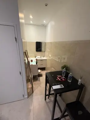 Cuisine ou kitchenette dans l'établissement LES BULLES DE MONA - Alcove - Spa - Clim