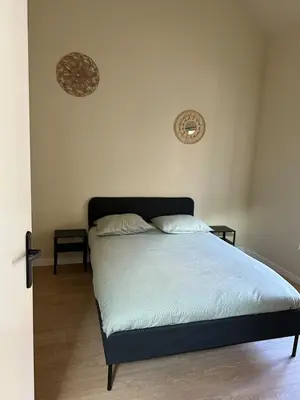 Un ou plusieurs lits dans un hébergement de l'établissement Appartement 2 chambres gare chateaucreux