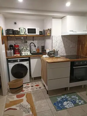 Cuisine ou kitchenette dans l'établissement Le Cosy chic