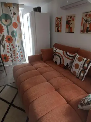 Coin salon dans l'établissement Le Cosy chic