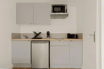 Cuisine ou kitchenette dans l'établissement L'Ecrin Lumière