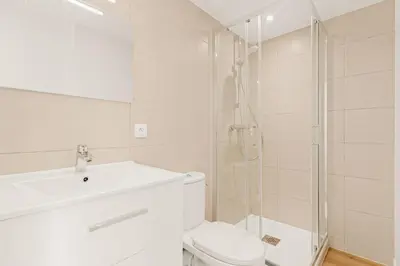 Salle de bains dans l'établissement L'Ecrin Lumière
