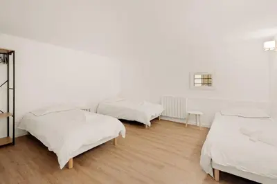 Un ou plusieurs lits dans un hébergement de l'établissement La Loge du Stade