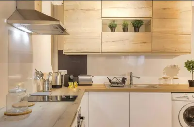 Cuisine ou kitchenette dans l'établissement LE REFUGE - STUDIO coeur Presqu'île