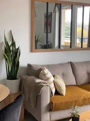 Coin salon dans l'établissement Duplex bohème et lumineux avec balcon, proche Lyon