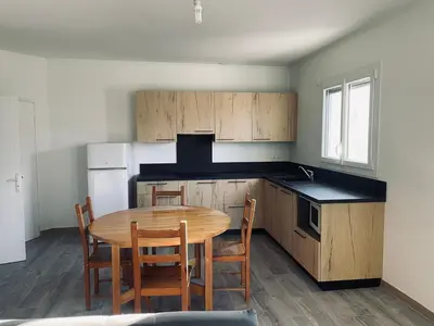 Cuisine ou kitchenette dans l'établissement Appartement fonctionnel