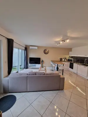 Coin salon dans l'établissement Appartement Plein Pied 4 Personne 50m2 avec Terrasse Privée