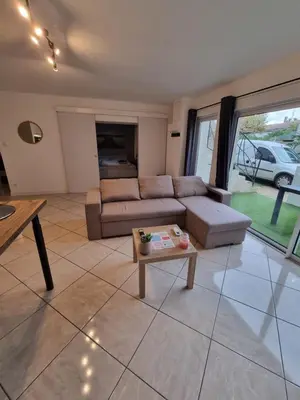 Coin salon dans l'établissement Appartement Plein Pied 4 Personne 50m2 avec Terrasse Privée