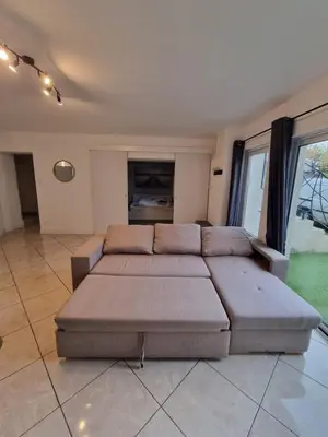 Coin salon dans l'établissement Appartement Plein Pied 4 Personne 50m2 avec Terrasse Privée