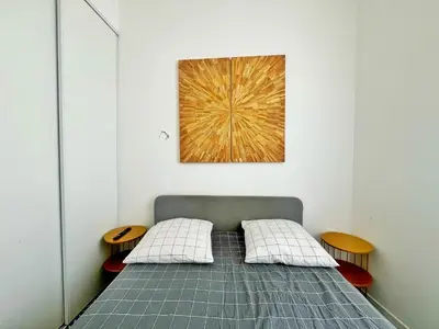 Un ou plusieurs lits dans un hébergement de l'établissement Suite Barrie - studio 2 personnes - Check in H24 & wifi
