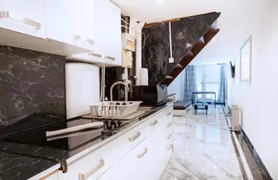 Coin salon dans l'établissement Appartement - Lyon 6th - Brotteaux
