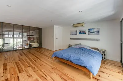 Un ou plusieurs lits dans un hébergement de l'établissement Large loft with terrace