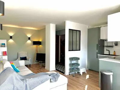 Cuisine ou kitchenette dans l'établissement Appartement Parking Metro