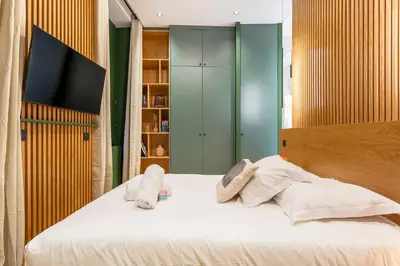 Un ou plusieurs lits dans un hébergement de l'établissement L'Exclusif Spa Suites Prestige Lyon Croix-Rousse