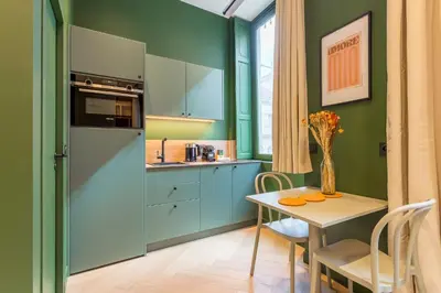 Cuisine ou kitchenette dans l'établissement L'Exclusif Spa Suites Prestige Lyon Croix-Rousse