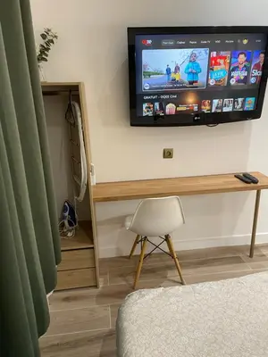 Télévision ou salle de divertissement dans l'établissement CHARMANT STUDIO à MONTCHAT