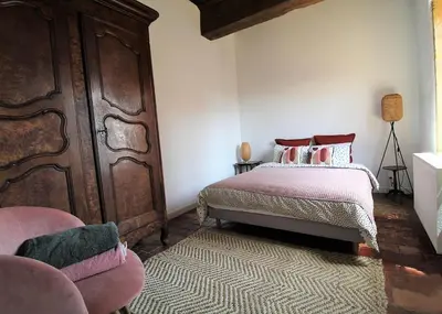 Un ou plusieurs lits dans un hébergement de l'établissement Maison Forte DES GRANDS MAISONS