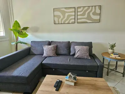 Coin salon dans l'établissement Le Friendly avec Parking - 6 pers - 15 min de Lyon - Balcon