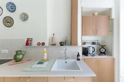 Cuisine ou kitchenette dans l'établissement Rétro Brotteaux - Proche Parc de la Tête-d'Or