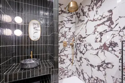 Salle de bains dans l'établissement Studio Art Déco Escapade Élégante et Raffinée